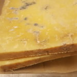 Is white mold on cheddar cheese harmful?