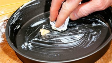 Should I grease a nonstick baking pan?