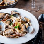 Should I soak clams before cooking?