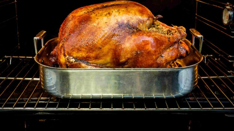 Should a turkey breast be cooked covered or uncovered?
