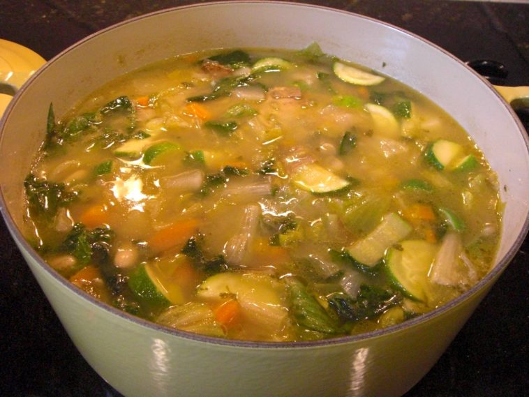 Should rice be cooked before adding to soup?