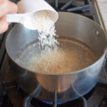 Should you boil water before adding rice?