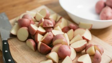 Should you cut potatoes before boiling for potato salad?