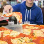 What do New Yorkers call pizza?