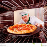What do you cook pizza on in the oven?