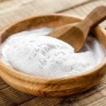 What does adding baking soda to chicken do?