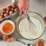 What does an extra egg do to a cake?