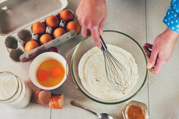 What does an extra egg do to a cake?