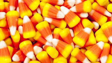 What does candy corn represent?