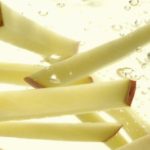 What does soaking potatoes in water do?