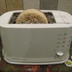 What does the crumpet setting on a toaster do?