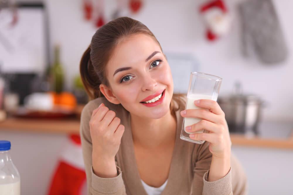 What does warm milk do to your body?