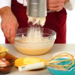 What happens if I put less sugar in a cake?