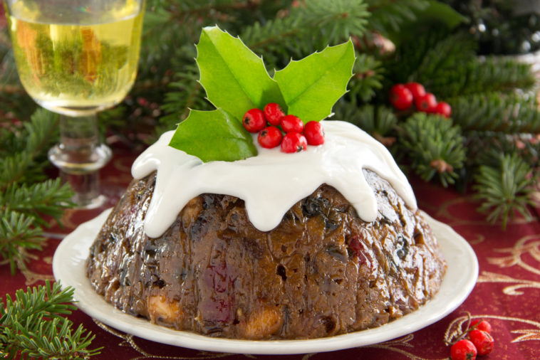What is Christmas pudding served with?