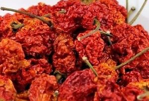 What is hotter Carolina Reaper or ghost pepper?
