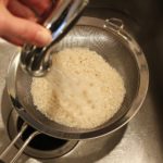 What is the benefit of rinsing rice?