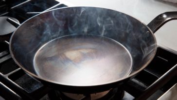 What is the best oil to season a carbon steel pan?