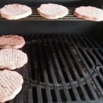 What is the best way to cook frozen hamburgers in the oven?
