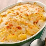 What is the difference between scalloped potatoes and au gratin?