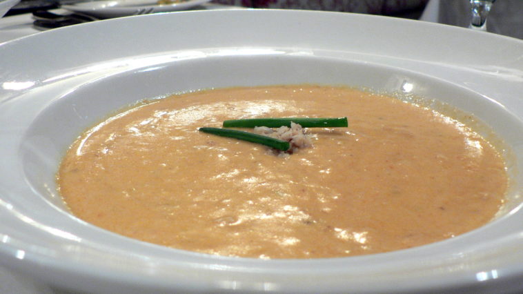 What is the difference between she crab soup and crab bisque?