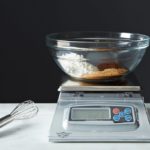 What is the importance of weighing scale in baking?