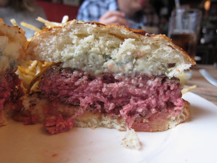 What is the secret to juicy hamburgers?