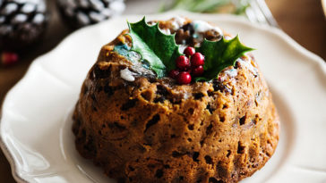 What is traditionally served with Christmas pudding?
