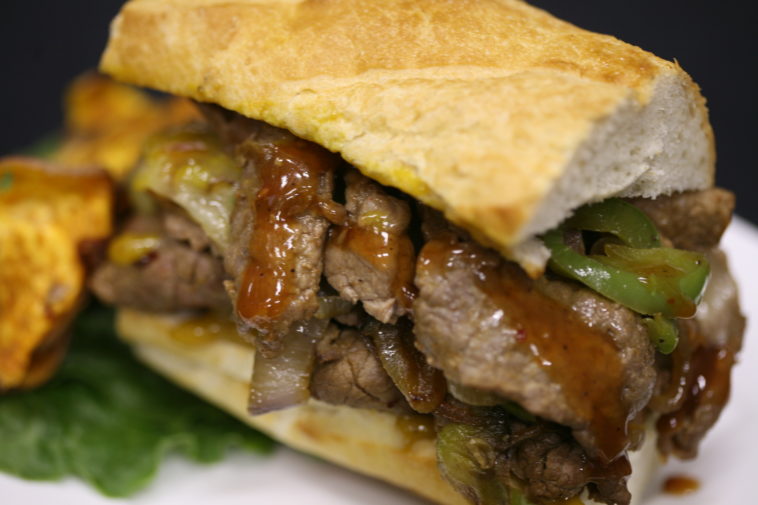 What sauce goes on a Philly cheesesteak?