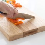 What should you not cut on a wooden cutting board?