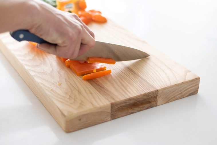 What should you not cut on a wooden cutting board?
