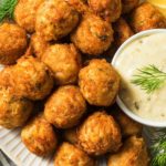 What temperature should crab cakes be cooked at?