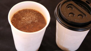 What temperature should hot chocolate be served at?