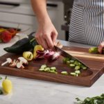 When cutting raw meat can you use a color cutting board?