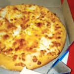 Which cheese is used in Domino's pizza?