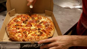 Who is the owner of Toppers Pizza?