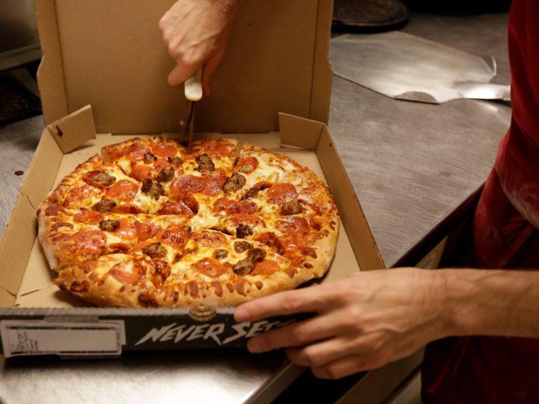 Who is the owner of Toppers Pizza?