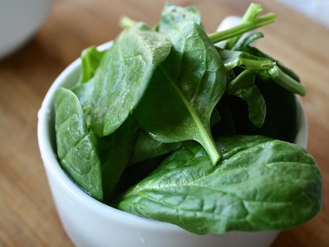 Who should not eat spinach?