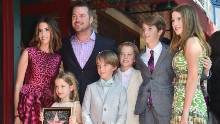 Why are Caroline and her husband so happy over Scrooge's death?