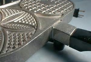 Why are my Pizzelles sticking to the iron?