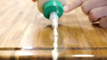 Why are wooden cutting surfaces not recommended?