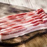 Why can you eat ham raw but not bacon?