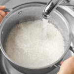 Why do people rinse rice?