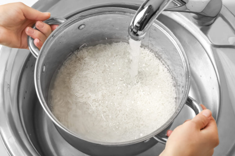 Why do people rinse rice?