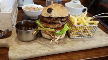 Why do restaurants warm plates?