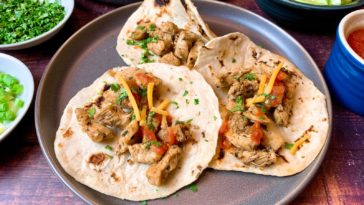 Why do street tacos have two tortillas?