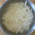 Why do you Soak potatoes in water before air frying?