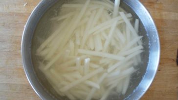 Why do you Soak potatoes in water before air frying?