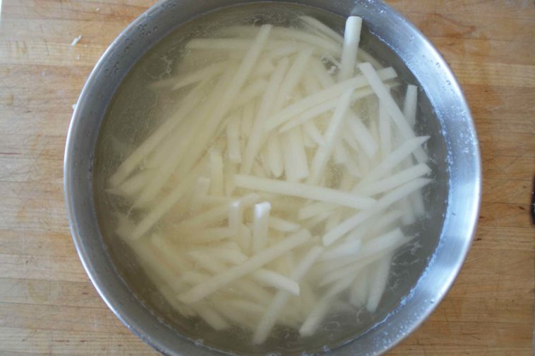 Why do you Soak potatoes in water before air frying?