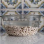 Why do you discard bean soaking water?
