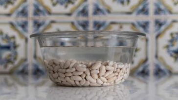 Why do you discard bean soaking water?